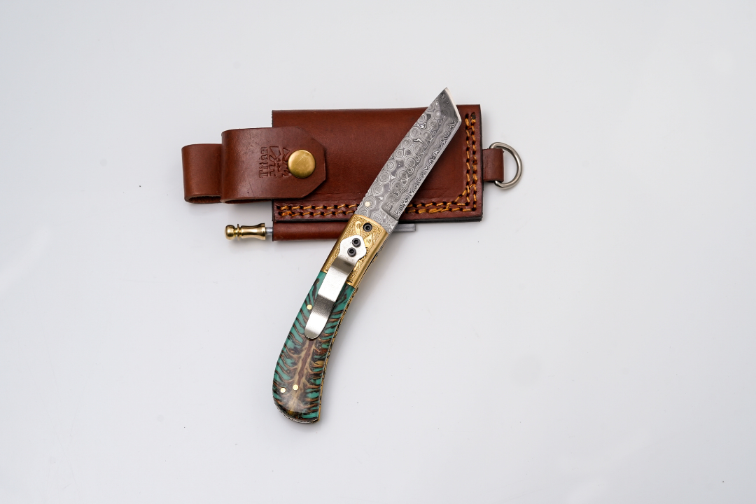 Hand-Forged Damascus Tanto Folder | Teal Pine Cone Handle with Engraved Brass Bolster & Fire Starter